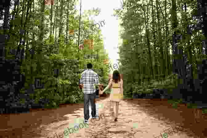 A Couple Walking Hand In Hand Down A Path, Surrounded By Blooming Flowers And The Road Goes On : Volume One