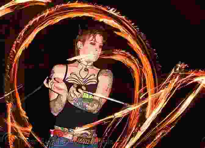 A Group Of Tattooed Men Perform A Fire Dance, Their Bodies Adorned With Vibrant Tattoo Designs. Burn (Men Of Inked: Heatwave 2)