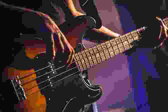 Close Up Of A Hand Playing Slap Bass On An Electric Bass Guitar. Ultimate Slap Bass Beginner Level (Bass Guitar Techniques By Stuart Clayton 1)