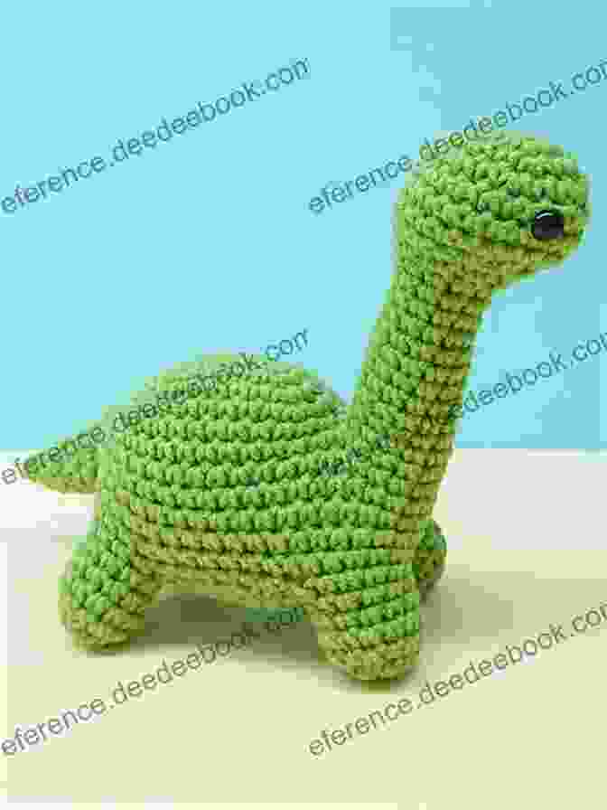 Gigantic And Lovable Brontosaurus Amigurumi, With A Long Neck And Sturdy Body. Dinosaurs To Crochet: Playful Patterns For Crafting Cuddly Prehistoric Wonders